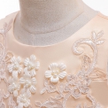 Biała sukienka komunijna zdobiona kwiatkami 3D